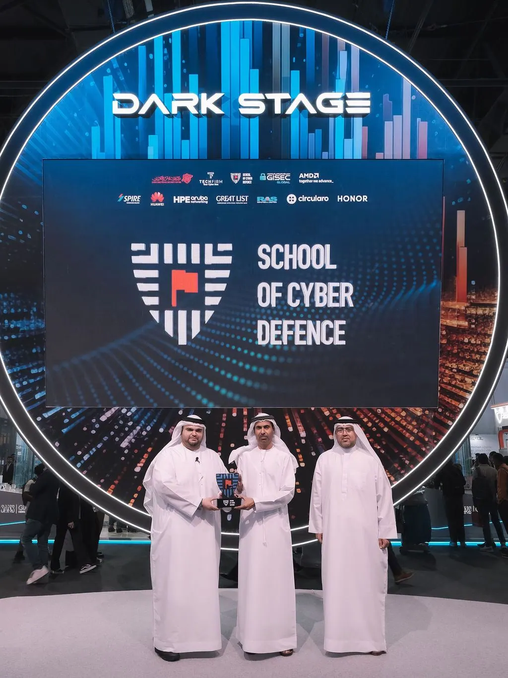 Award handover on the Dark Stage at GISEC Global